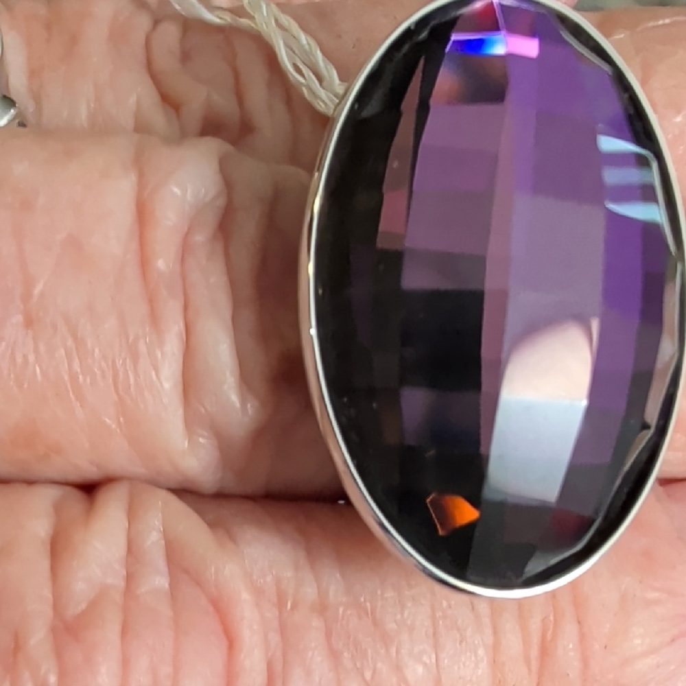 Calvin Klein Sterling Silver Ring with Faceted Purple Oval Pendant